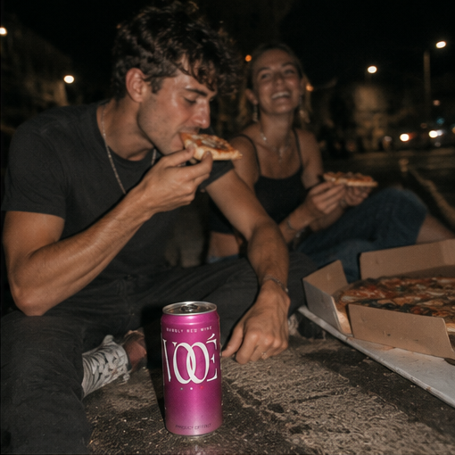 Pizza on a curb at night with VOOÉ